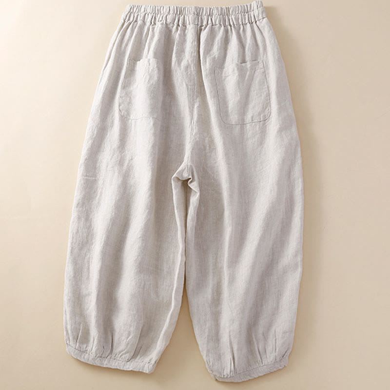 Pantalones harem holgados con cordón ajustable, estampado floral y Buddha Stones, color liso. - image 1