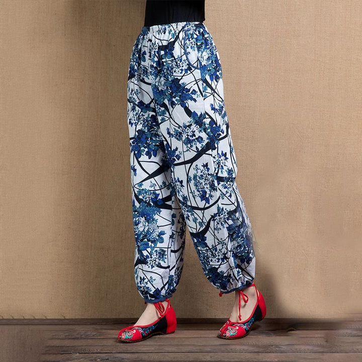 Pantalones harén con bolsillos y estampado de flores de árbol en azul de Buddha Stones - image 7
