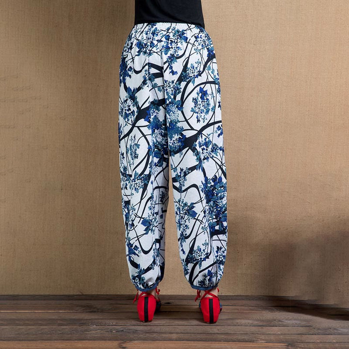 Pantalones harén con bolsillos y estampado de flores de árbol en azul de Buddha Stones - image 9