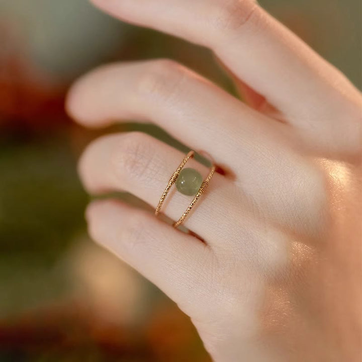 Anillo ajustable de la suerte de cobre de doble capa con cuentas de perlas de Jade redondas de Buddha Stones