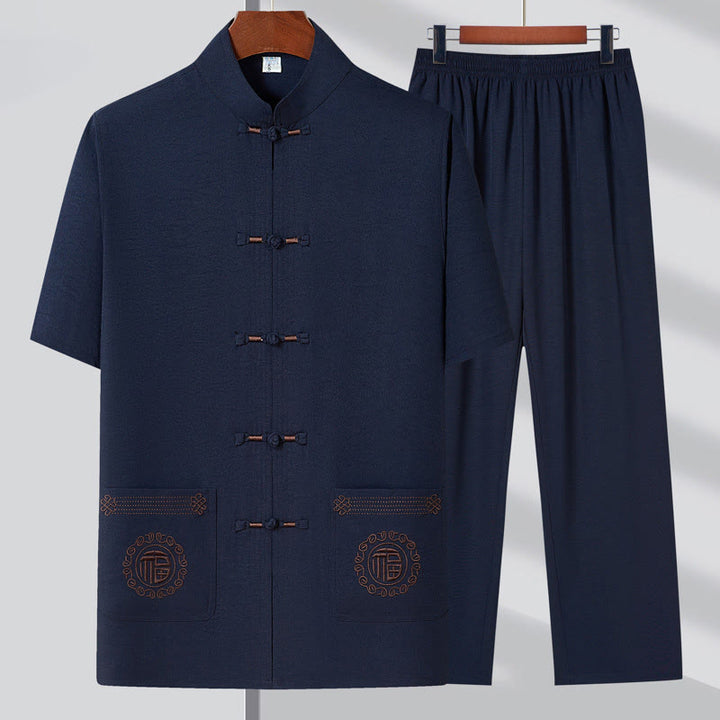 Buddha Stones Fu personaje bordado traje Tang tradicional botón de rana manga corta Top pantalones ropa conjunto para hombres - Azul oscuro (Top y pantalón) - 4XL(Equivalente a la talla 44 de US/UK/AU44; 54 de la UE) - image 1