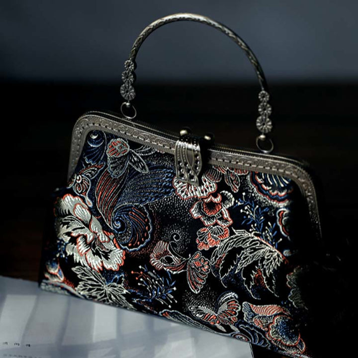 Bolso de mano con asa de metal y flores de mariposa y Buddha Stones