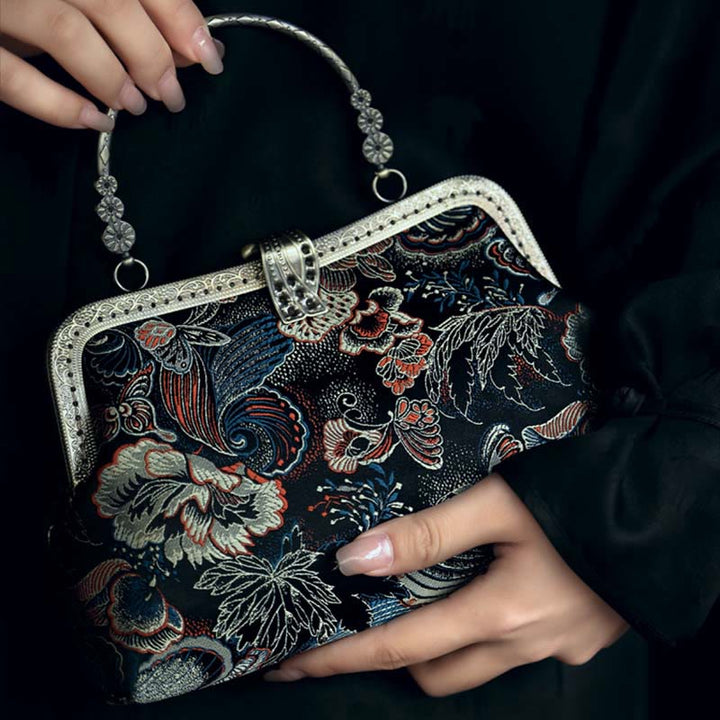 Bolso de mano con asa de metal y flores de mariposa y Buddha Stones