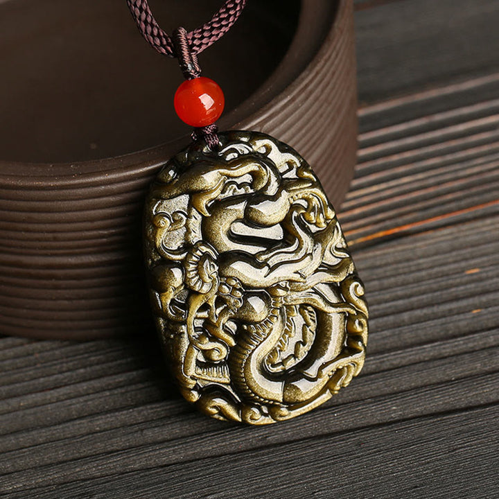 Colgante de collar con diseño de dragón de obsidiana con brillo dorado de Buddha Stones - image 2