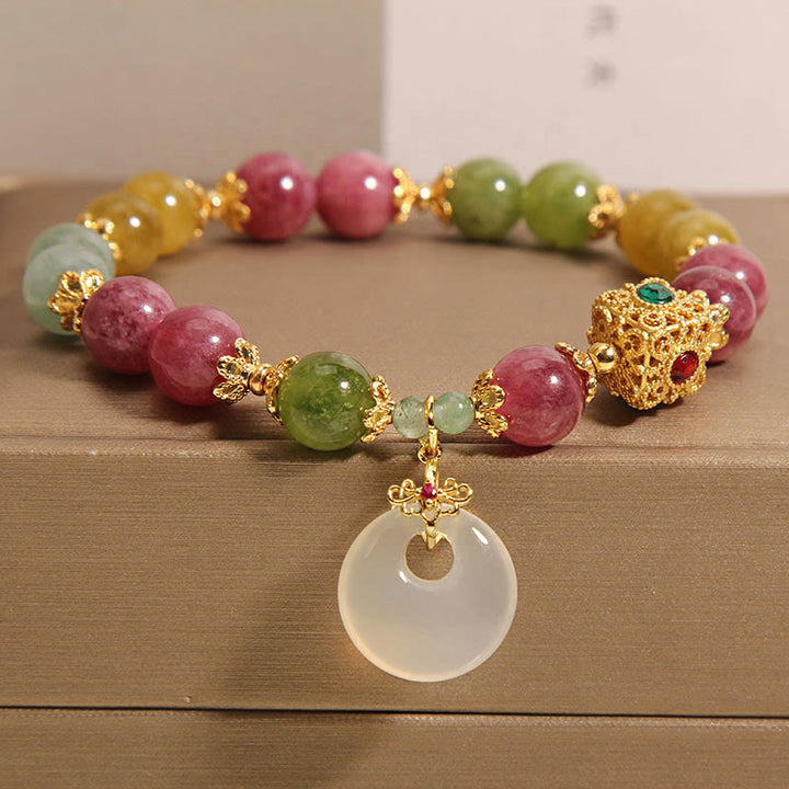 Pulsera de sabiduría con dije de hebilla de paz y turmalina colorida con Buddha Stones