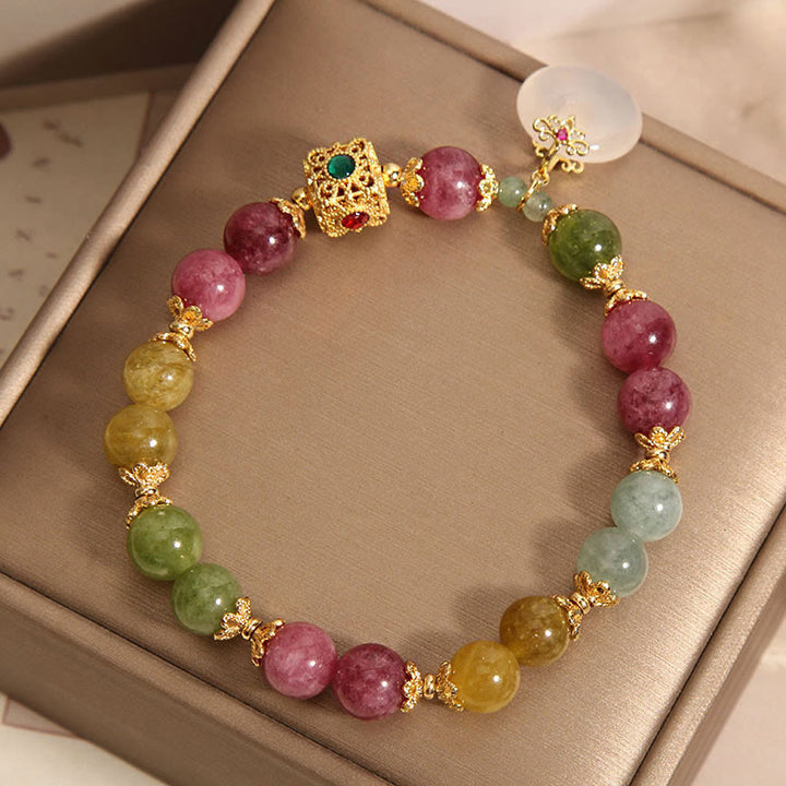 Pulsera de sabiduría con dije de hebilla de paz y turmalina colorida con Buddha Stones