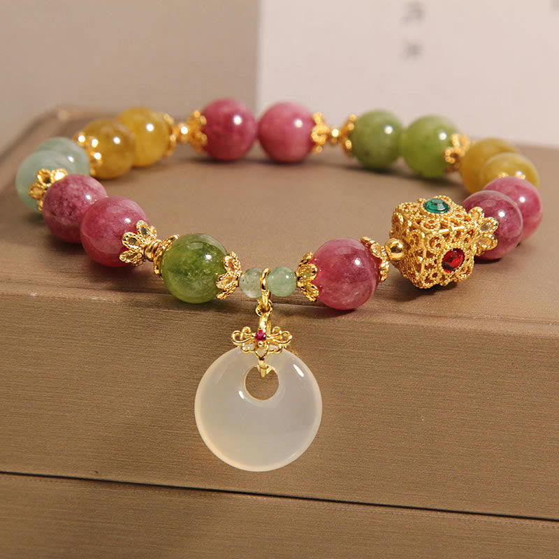 Pulsera de sabiduría con dije de hebilla de paz y turmalina colorida con Buddha Stones