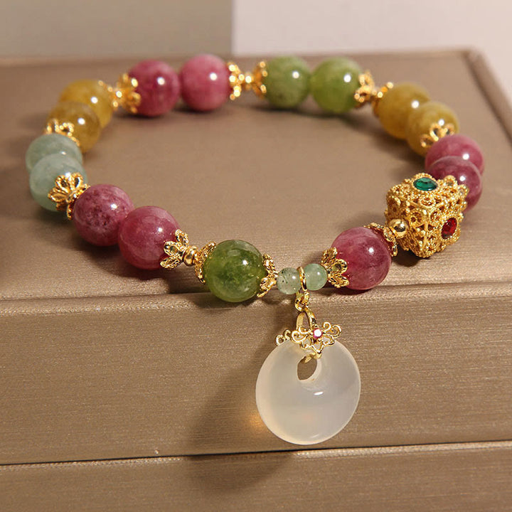 Pulsera de sabiduría con dije de hebilla de paz y turmalina colorida con Buddha Stones