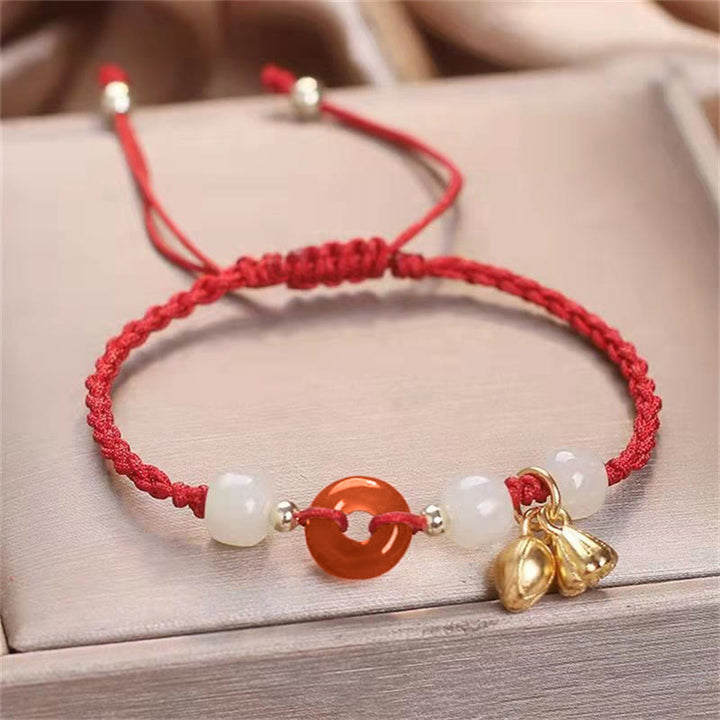 Pulsera trenzada curativa de loto de jade con hebilla de la paz de ágata roja con Buddha Stones