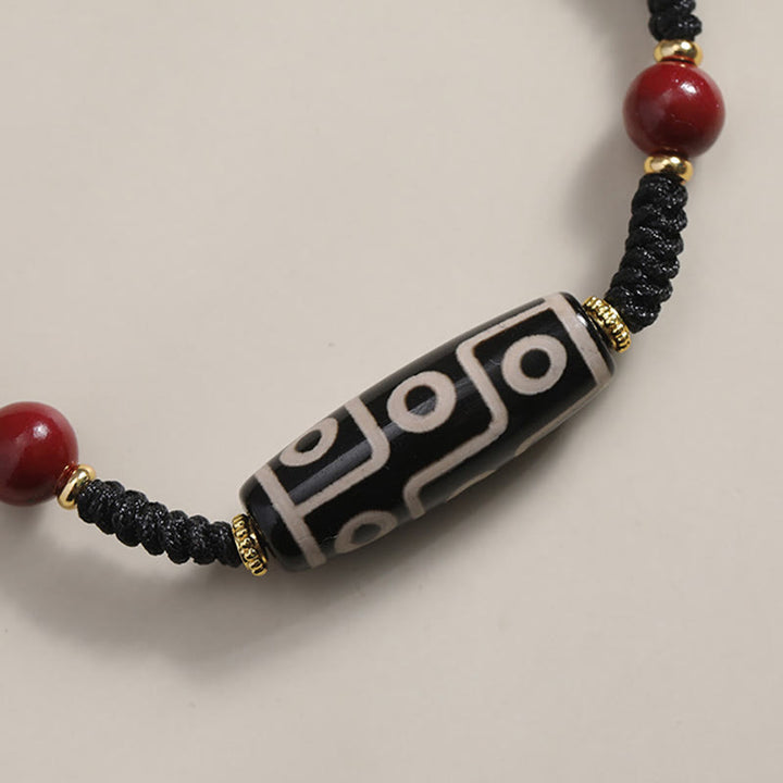 Pulsera de protección de cuentas Dzi tibetana de nueve ojos hecha a mano con Buddha Stones