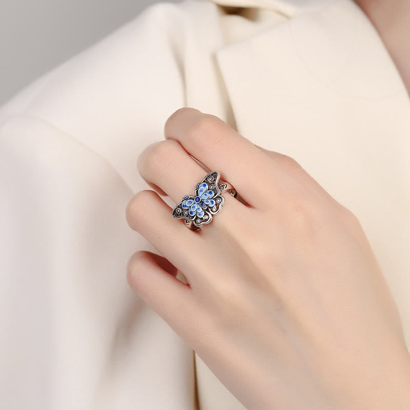 Anillo de amor con patrón de mariposa azul esmaltado hueco con Buddha Stones