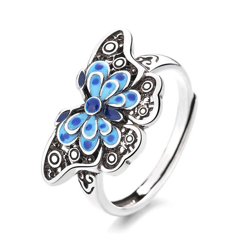 Anillo de amor con patrón de mariposa azul esmaltado hueco con Buddha Stones