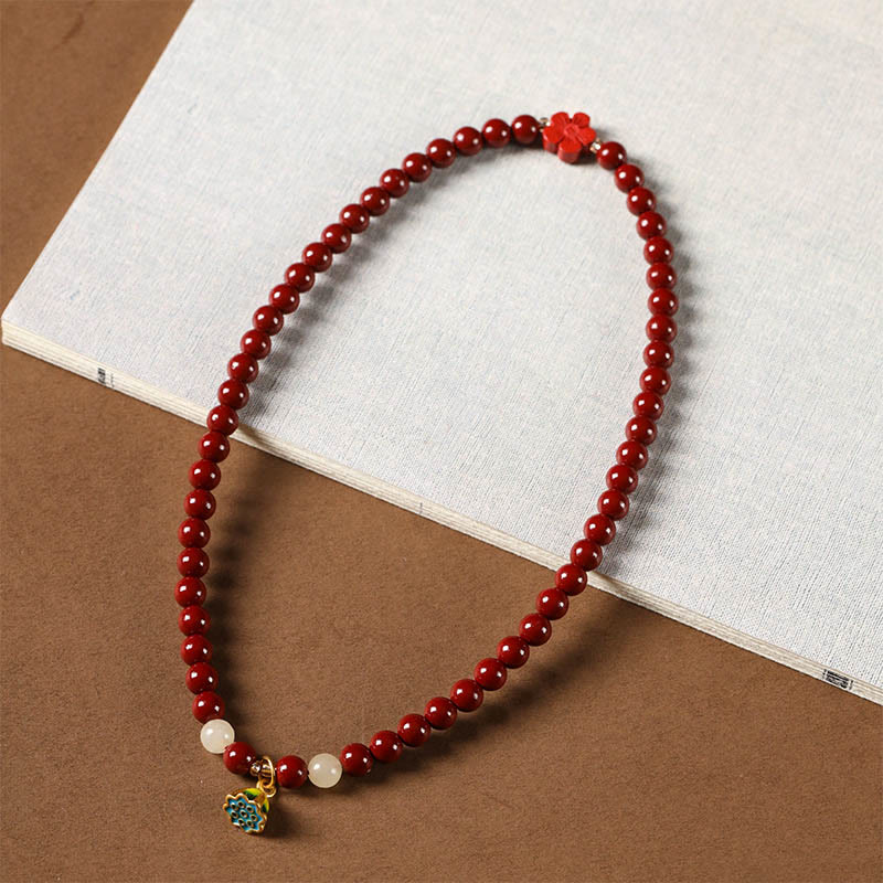 Pulsera de bendición con colgante de loto y cinabrio con Buddha Stones