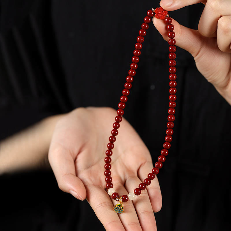 Pulsera de bendición con colgante de loto y cinabrio con Buddha Stones