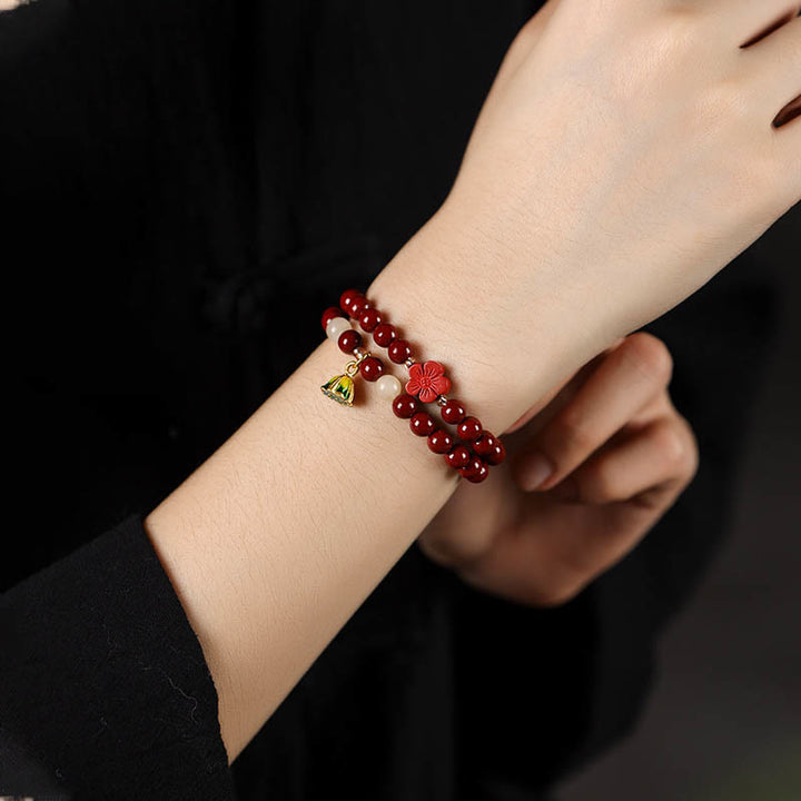 Pulsera de bendición con colgante de loto y cinabrio con Buddha Stones