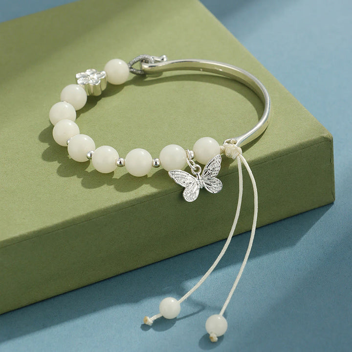 Brazalete de pulsera con Buddha Stones, semilla de Bodhi, mariposa, loto, suerte y riqueza