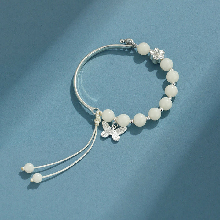 Brazalete de pulsera con Buddha Stones, semilla de Bodhi, mariposa, loto, suerte y riqueza