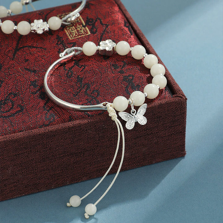 Brazalete de pulsera con Buddha Stones, semilla de Bodhi, mariposa, loto, suerte y riqueza