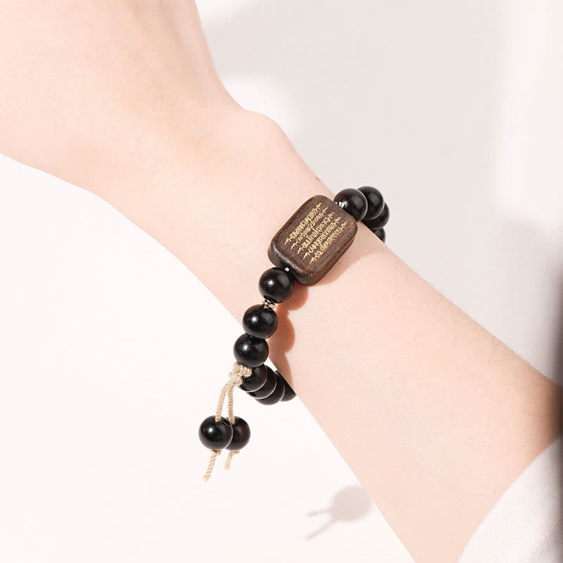 Pulsera de Paz Grabada con Escrituras en Madera de Ébano de Piedras de Buda