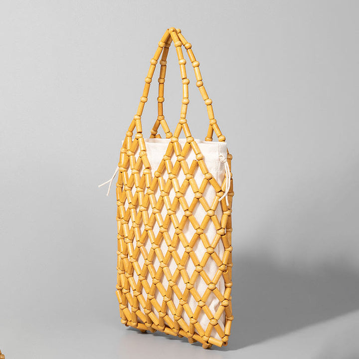 Bolsa de mano de cuentas de madera huecas tejidas a mano con piedras de Buda