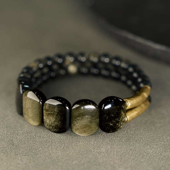 Buddha Stones Pulsera reforzada de obsidiana negra con brillo dorado - image 3