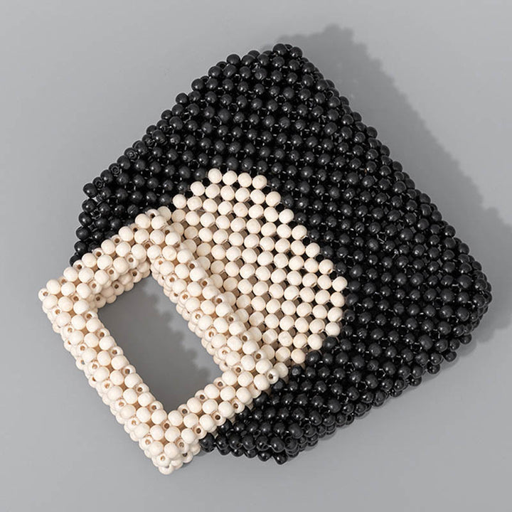 Bolso cuadrado tejido a mano con cuentas de madera y piedras de Buda