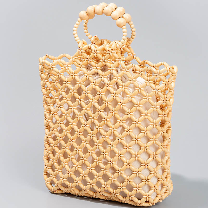 Bolso de cuentas de madera huecas tejidas a mano con hilo de pesca tejida y piedras de Buda
