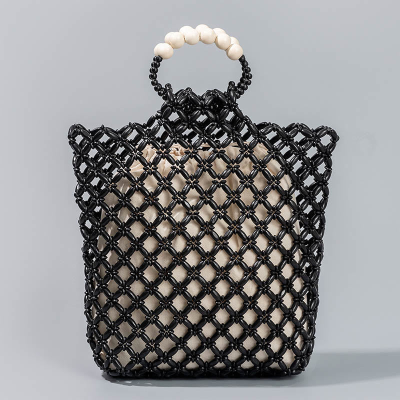 Bolso de cuentas de madera huecas tejidas a mano con hilo de pesca tejida y piedras de Buda