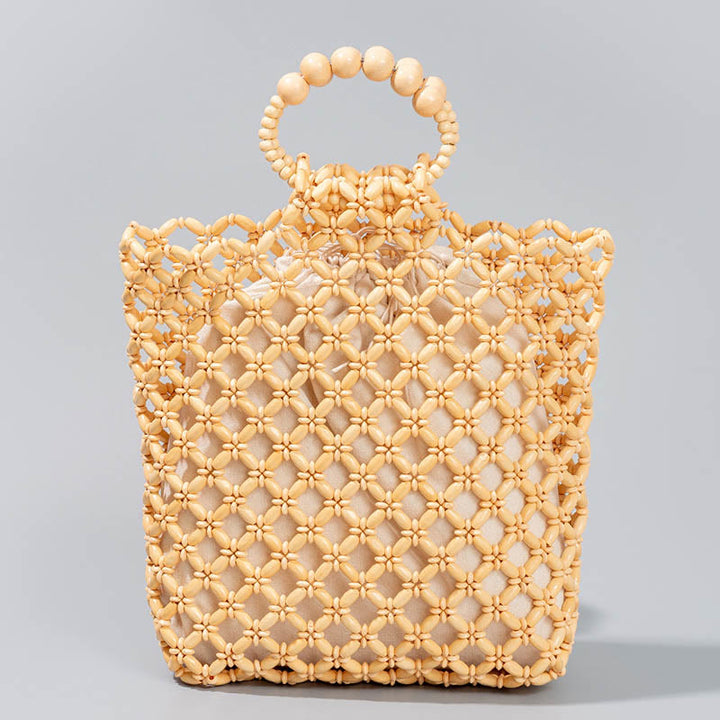 Bolso de cuentas de madera huecas tejidas a mano con hilo de pesca tejida y piedras de Buda