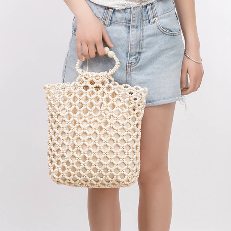 Bolso de cuentas de madera huecas tejidas a mano con hilo de pesca tejida y piedras de Buda