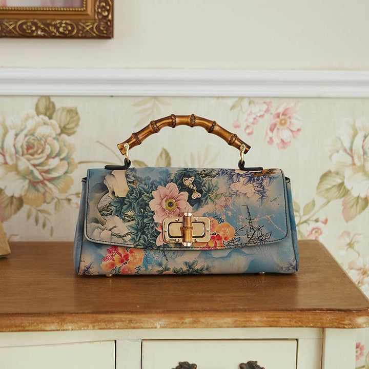 Bolso de mano cruzado con cadena de metal y asa de bambú con patrón de flores y piedras de Buda
