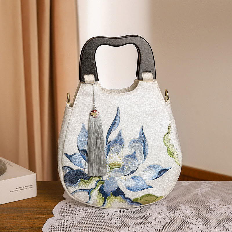 Bolso de mano bordado con piedras de Buda y loto