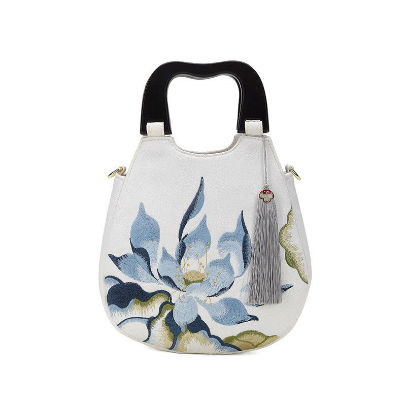 Bolso de mano bordado con piedras de Buda y loto