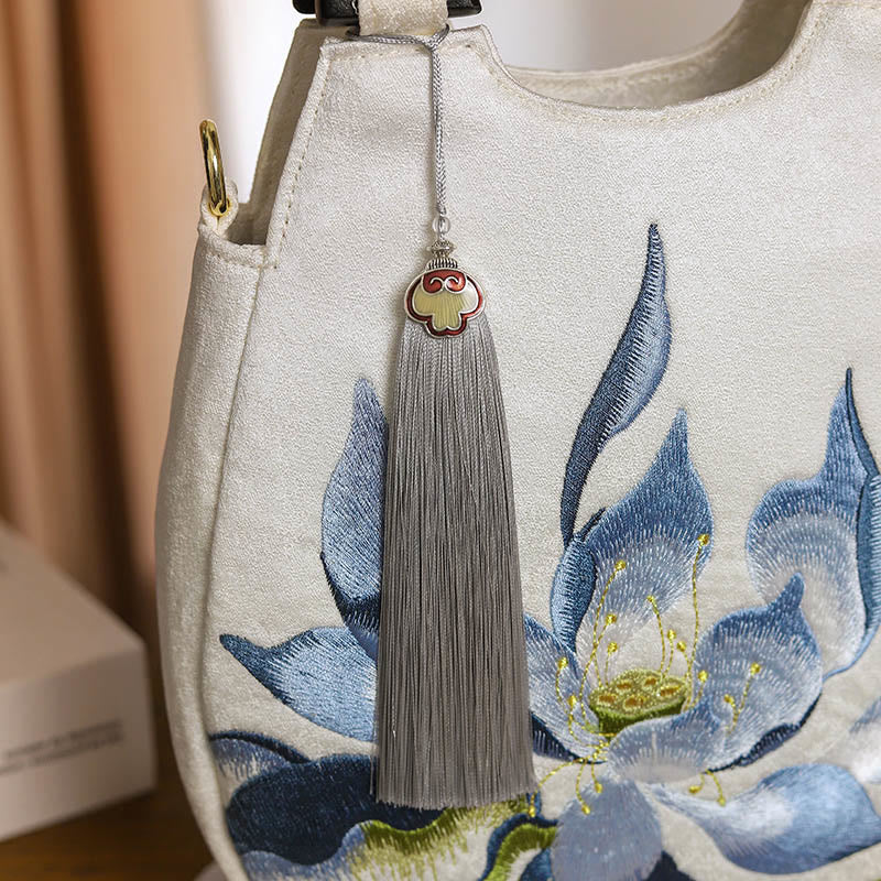 Bolso de mano bordado con piedras de Buda y loto