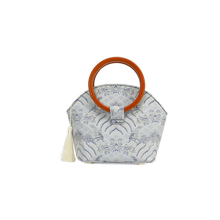Bolso de mano con estampado de piedras de Buda, nubes auspiciosas y conchas