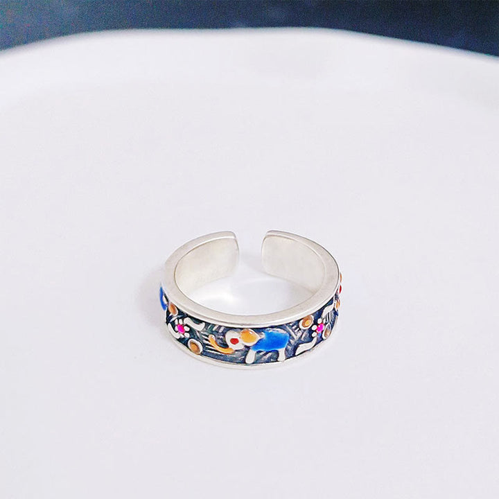 Anillo ajustable de fuerza con elefante tallado y colorido de Buddha Stones
