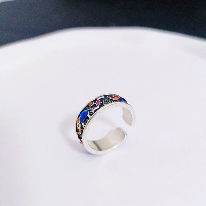 Anillo ajustable de fuerza con elefante tallado y colorido de Buddha Stones