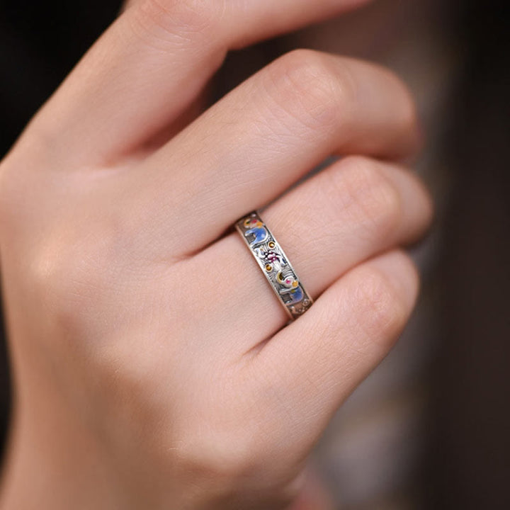 Anillo ajustable de fuerza con elefante tallado y colorido de Buddha Stones