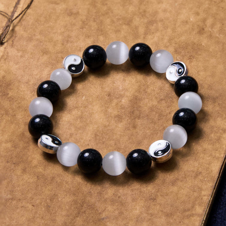 Pulsera de fuerza de purificación Yin Yang de ojo de gato de obsidiana negra con Buddha Stones