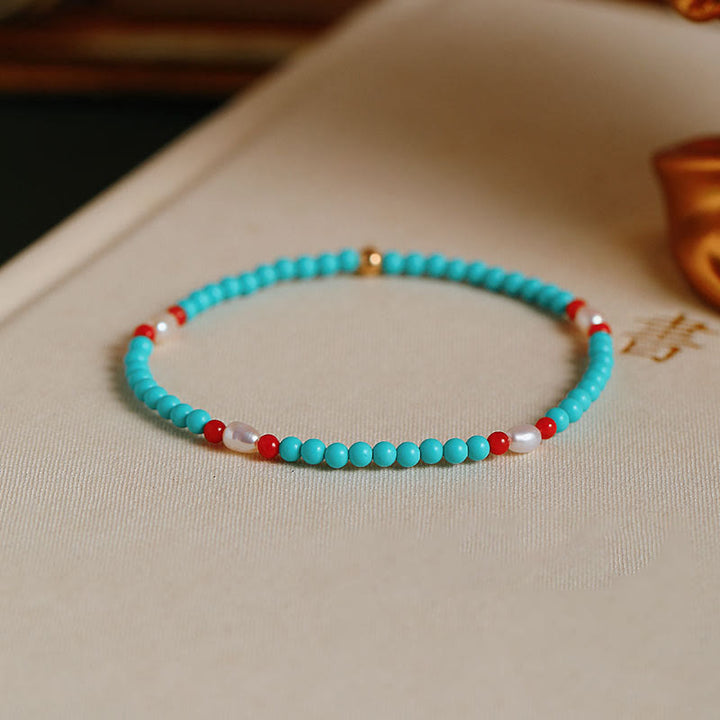 Pulsera de protección de pequeñas cuentas de piedras de Buda con turquesa, ágata roja y perla