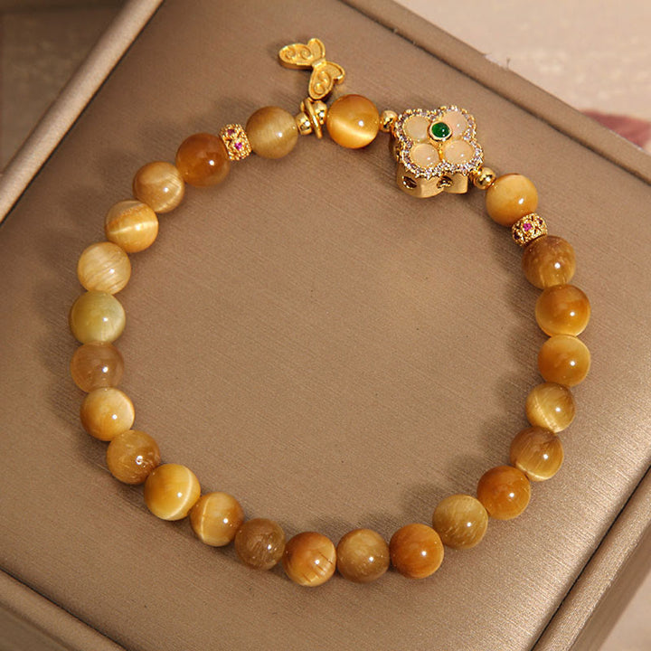 Pulsera de Protección de Buddha Stones con Ojo de Tigre y Mariposa de Trébol de Cuatro Hojas