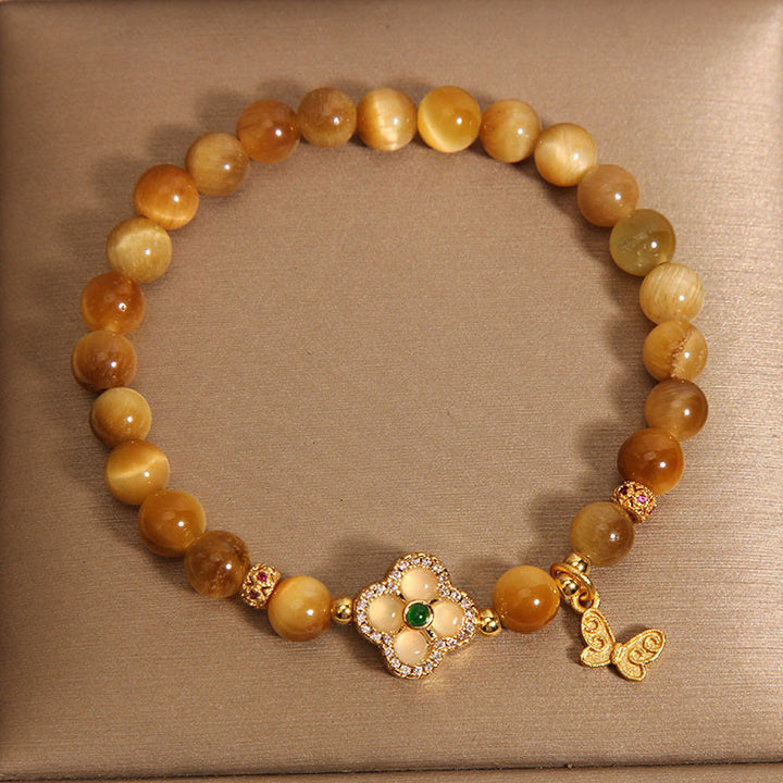 Pulsera de Protección de Buddha Stones con Ojo de Tigre y Mariposa de Trébol de Cuatro Hojas
