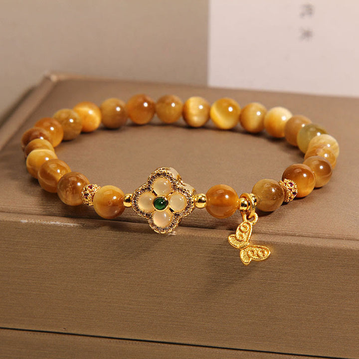 Pulsera de Protección de Buddha Stones con Ojo de Tigre y Mariposa de Trébol de Cuatro Hojas