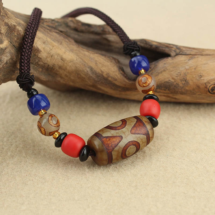 Buddha Stones Joyas Tibetanas de Ojo de Nueve Dzi Cuentas Dzi de Tres Ojos Collar de Protección Colgante