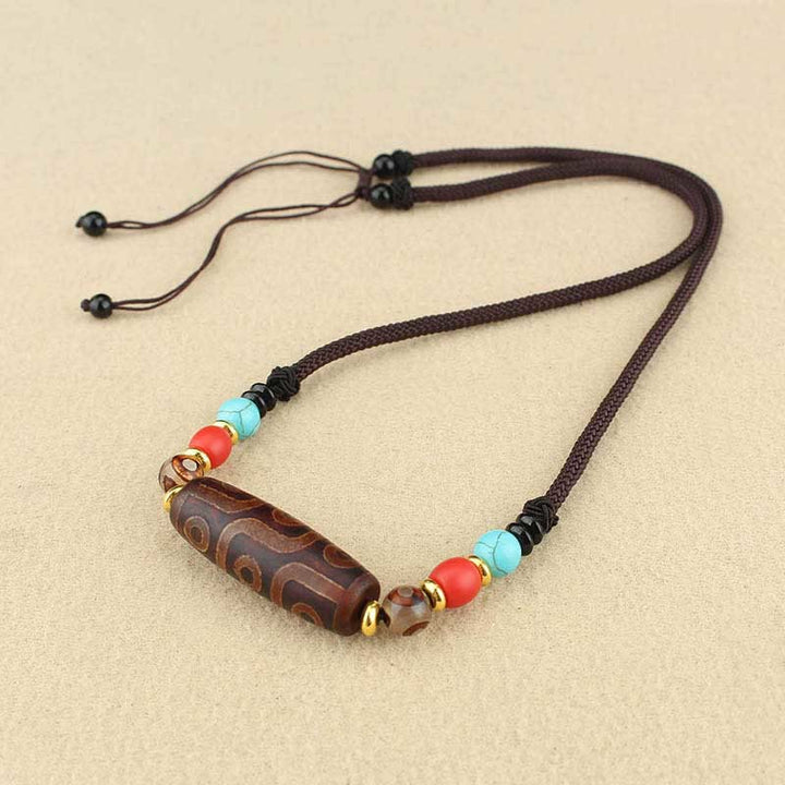 Buddha Stones Joyas Tibetanas de Ojo de Nueve Dzi Cuentas Dzi de Tres Ojos Collar de Protección Colgante