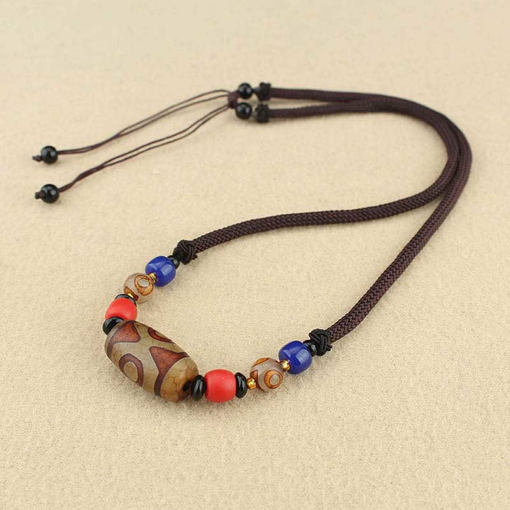 Buddha Stones Joyas Tibetanas de Ojo de Nueve Dzi Cuentas Dzi de Tres Ojos Collar de Protección Colgante