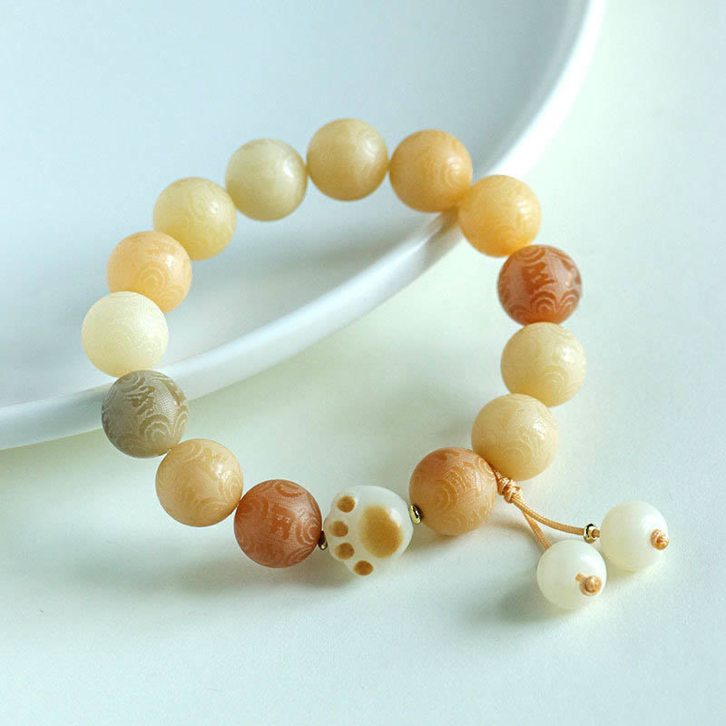 Buddha Stones Pulsera Armonía Tallada Om Mani Padme Hum de Semilla de Bodhi