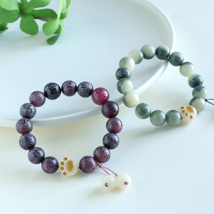 Buddha Stones Pulsera Armonía Tallada Om Mani Padme Hum de Semilla de Bodhi