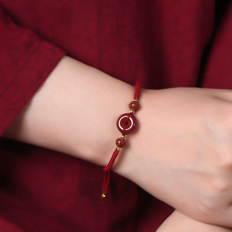 Buddha Stones Pulsera tejida a mano de cinabrio con hebilla de paz de loto, bendición y calma