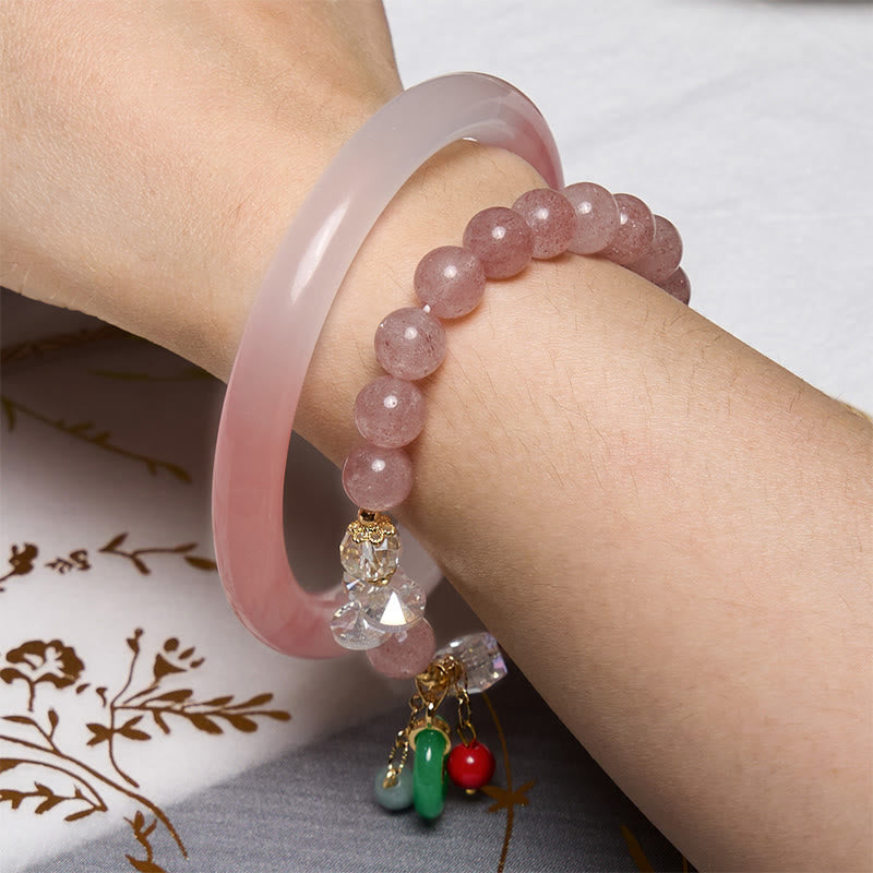 Buddha Stones Atraer amor y protección Pulsera rosa Paquete